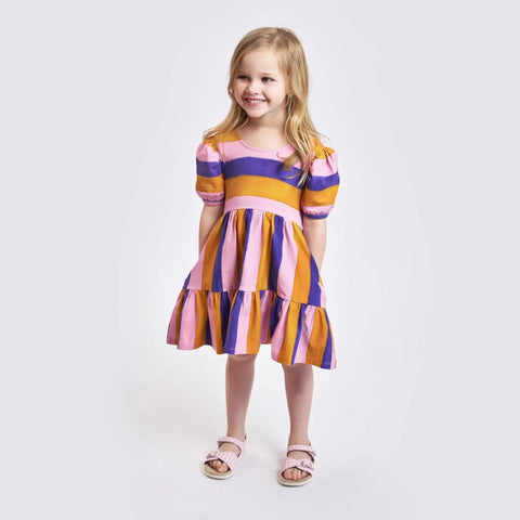 Child wearing a striped Sonny Side Up dress