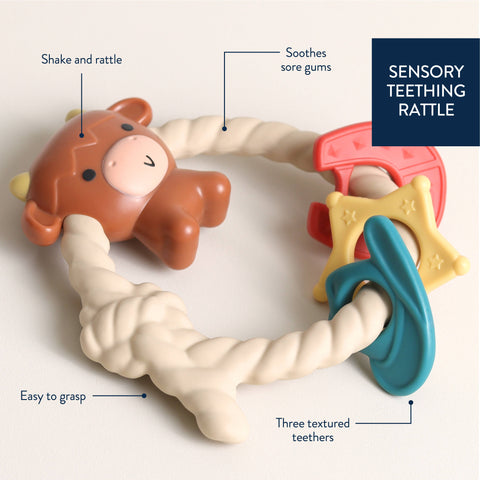 Ritzy Rattle™ Silicone Teething Rattle - Highland Cow