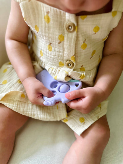 Itzy Pop Teether: Lilac Dinosaur - Itzy Ritzy